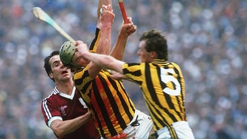 Ger Henderson of Kilkenny (bloodied) with team-mate Liam Walsh and Galway's Brendan Lynskey from the 1987 All-Ireland final