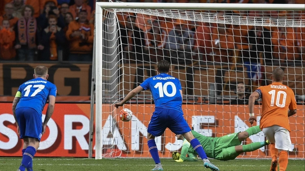 Iceland's Gylfi Sigurdsson beats Jasper Cillessen from the spot in Amsterdam