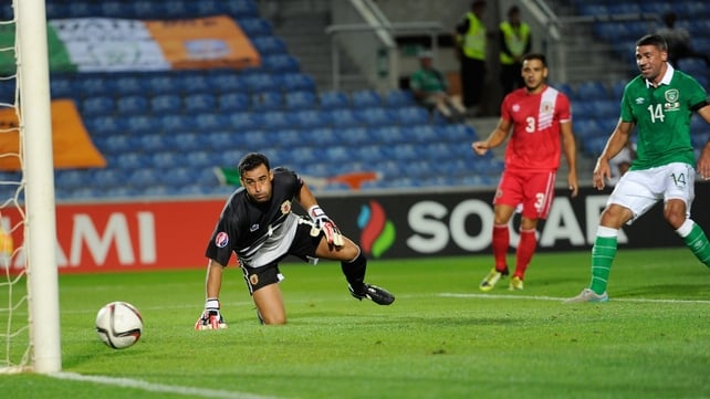 Cyrus Christie helped Ireland to a routine 4-0 win over Gibraltar, while Scotland lost 1-0 away to Georgia to give Martin O'Neill's men hope