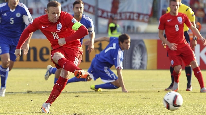 Wayne Rooney slots home his 49th international goal from the penalty spot