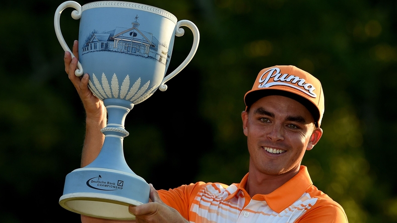 Rickie Fowler with the Deutsche Bank Championship winners trophy