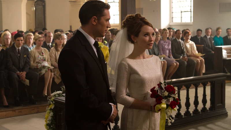 Emily Browning plays Reggie's long-suffering wife