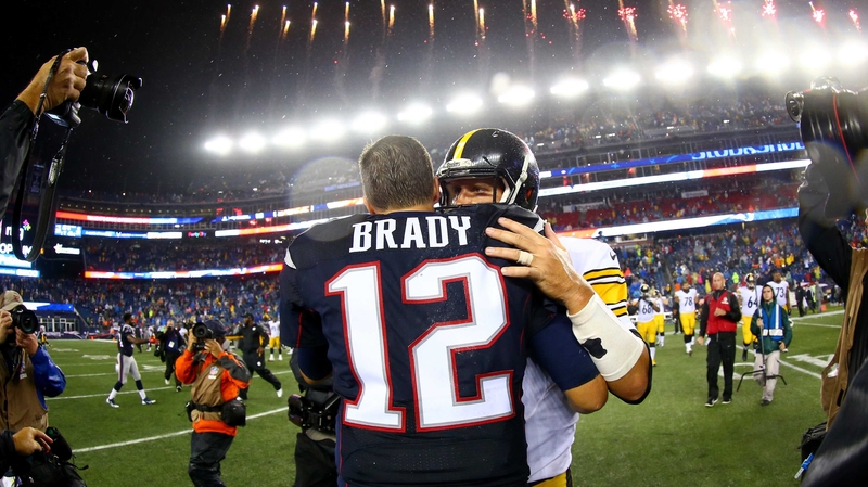 Tom Brady and opposition quarterback Ben Roethlisberger embrace after the season opener