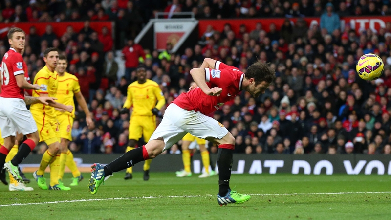 Juan Mata scores against Liverpool last season