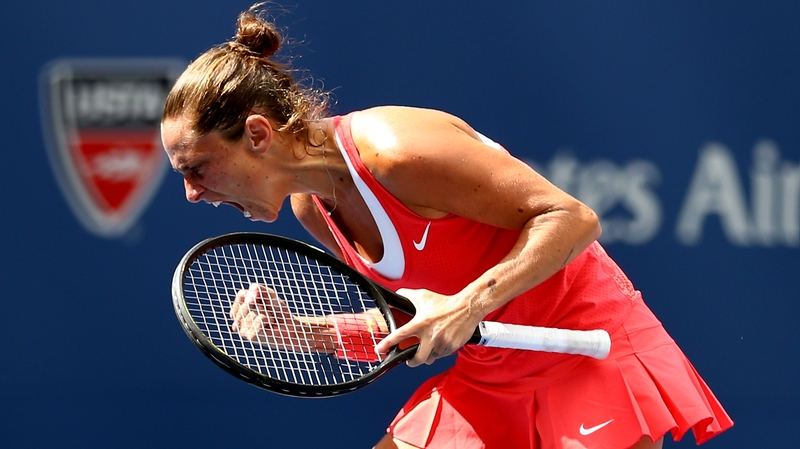 Roberta Vinci reacts after beating Serena Williams in the US Open semi-final