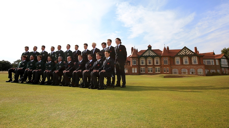 The Great Britain and Ireland and United States teams pose before play got under way