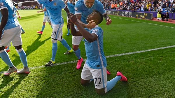 Kelechi Iheanacho drops to his knees to celebrate scoring the winner for Man City