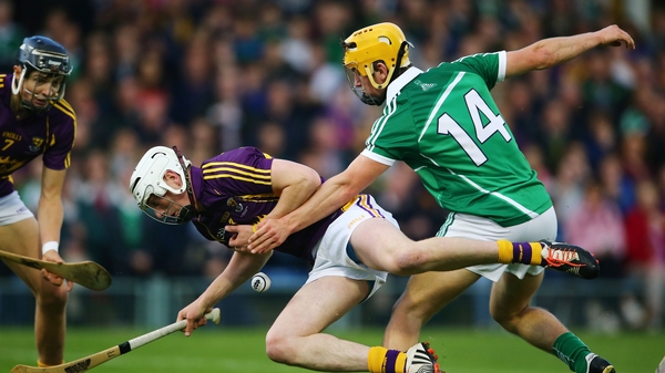 Tom Morrissey of Limerick tackles Wexford's Liam Ryan in the All-Ireland Under-21 Championship final