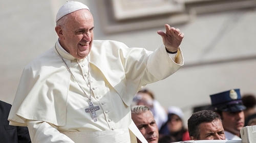 Pope Francis practises his Bono moves