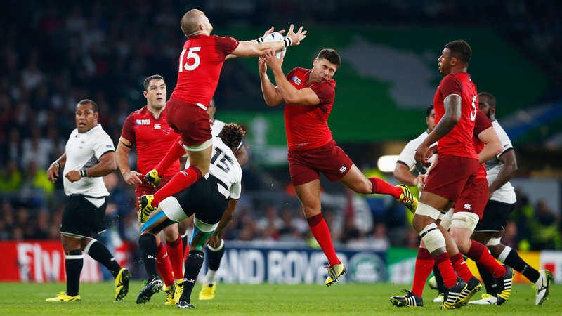 England's Mike Brown and Ben Youngs compete for the ball during the 2015 Rugby World Cup Pool A match against Fiji