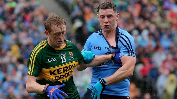 Philly McMahon and Colm Cooper battle in the All-Ireland final
