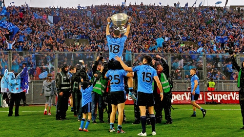 Dublin players celebrate in front of a jubilant Hill 16