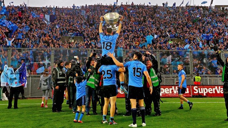 Dublin players celebrate in front of a jubilant Hill 16
