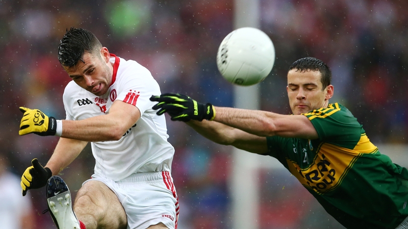 Darren McCurry (L) has left the Tyrone panel