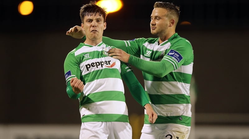 Mikey Drennan congratulates goalscorer Brandon Miele (R)