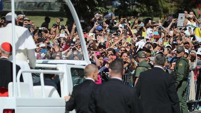 The Pope waves to the crowd