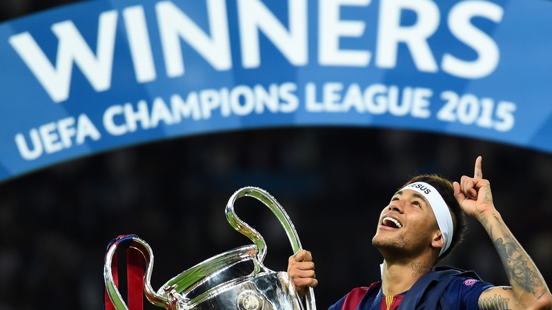 Neymar celebrates with the European Cup after beating Juventus in the final