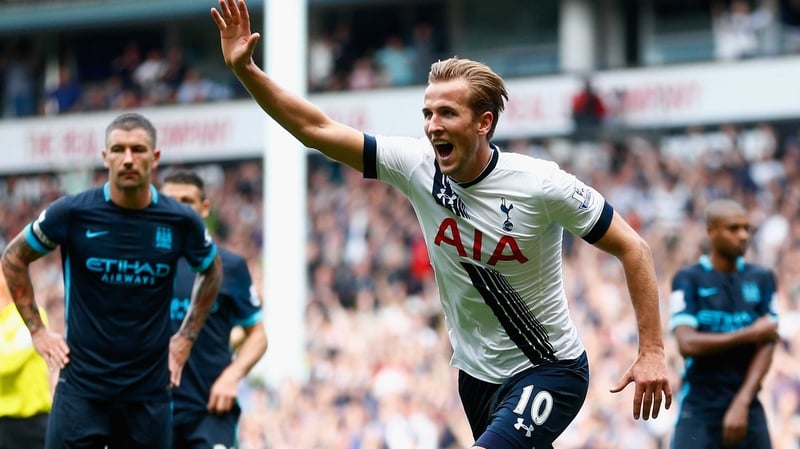 Harry Kane wheels away in celebration after his goal