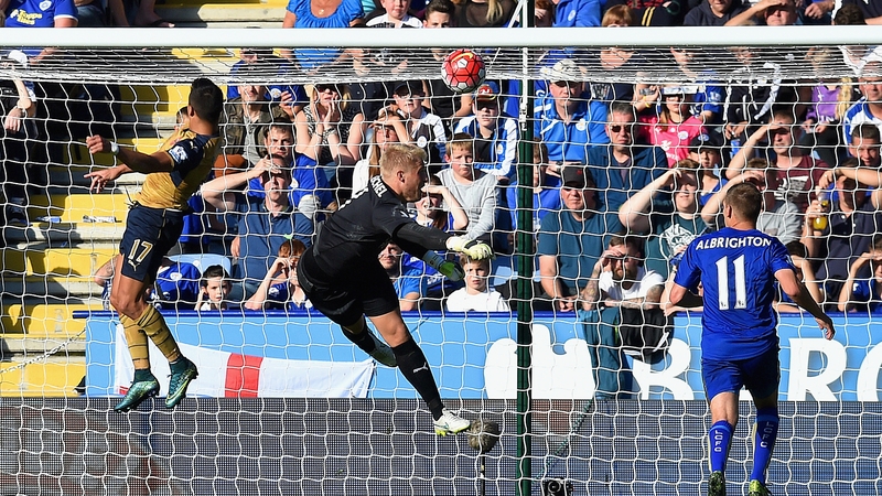 Alexis Sanchez heads home Arsenal's third goal