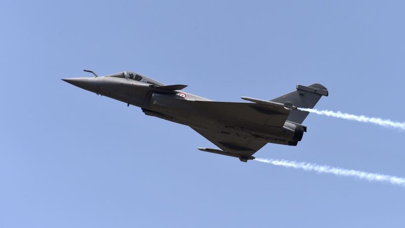 A French war plane takes part in an air show earlier this year