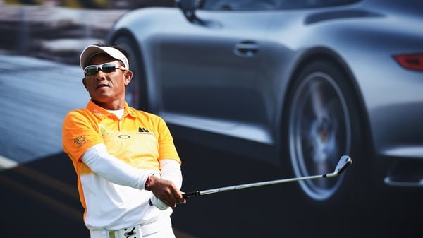 Thongchai Jaidee of Thailand plays a shot on his way to winning the Porsche European Open