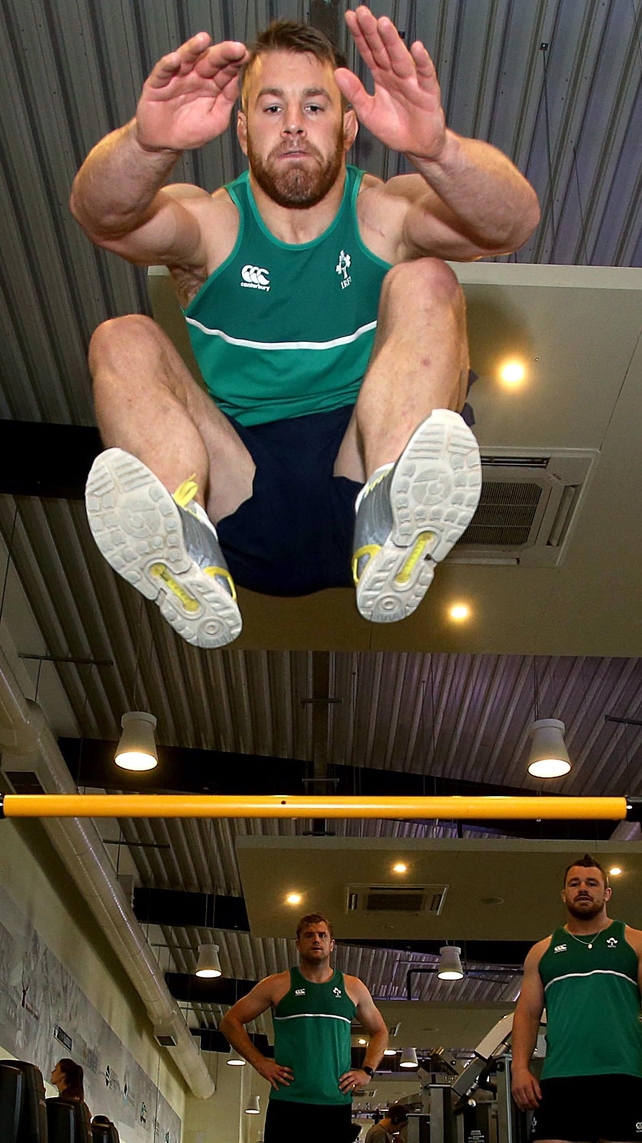 Flanker Sean O'Brien hits the heights with fellow forwards Jamie Heaslip and Cian Healy looking on