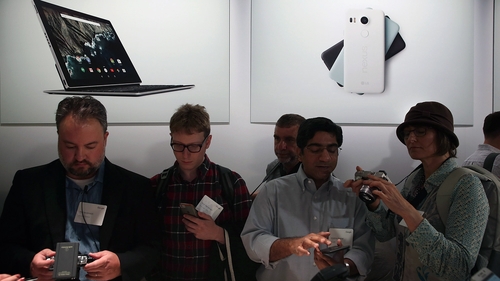Attendees inspect the new Nexus 5X phone during Google's media event in San Francisco