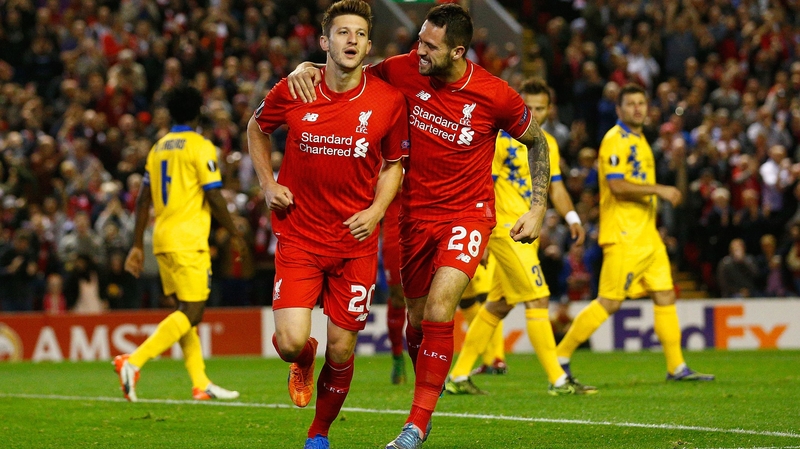Liverpool's Adam Lallana (L) celebrates scoring the opening goal wth Danny Ings