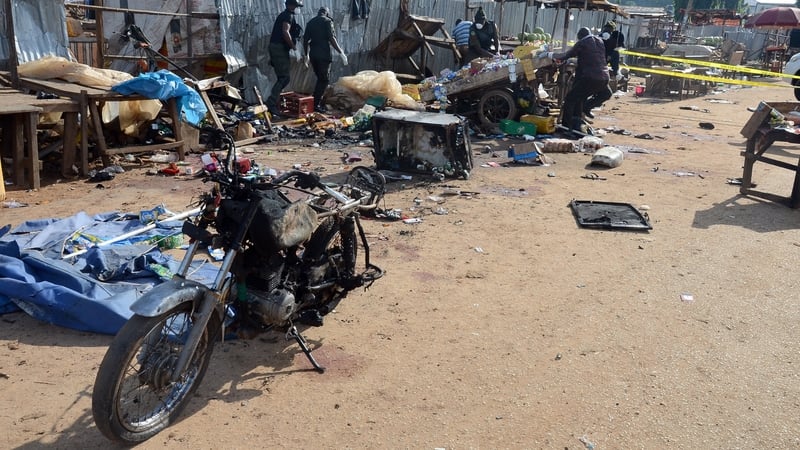 One of the bombs went off near a police station in the satellite town of Kuje