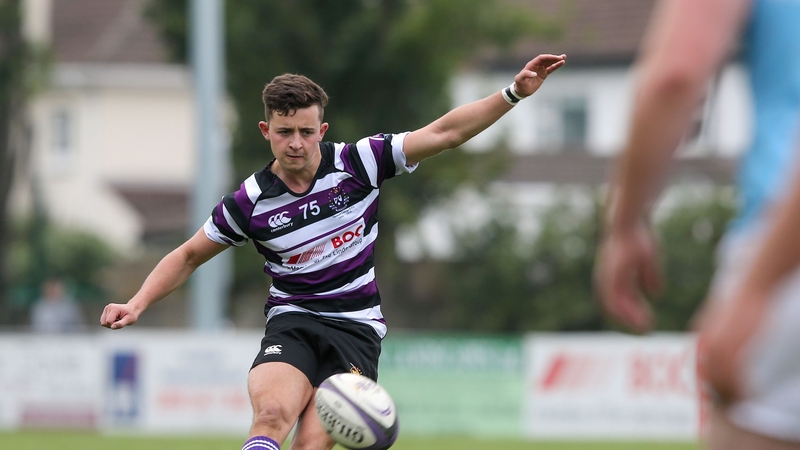 Terenure's Jake Swaine kicks the winning the penalty against Garryowen