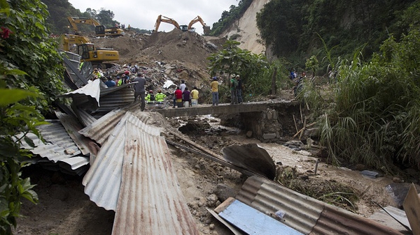 Families scrabbled through rubble to find the bodies of loved-ones