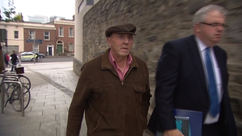 Thomas 'Slab' Murphy, seen here in the hat, has pleaded not guilty