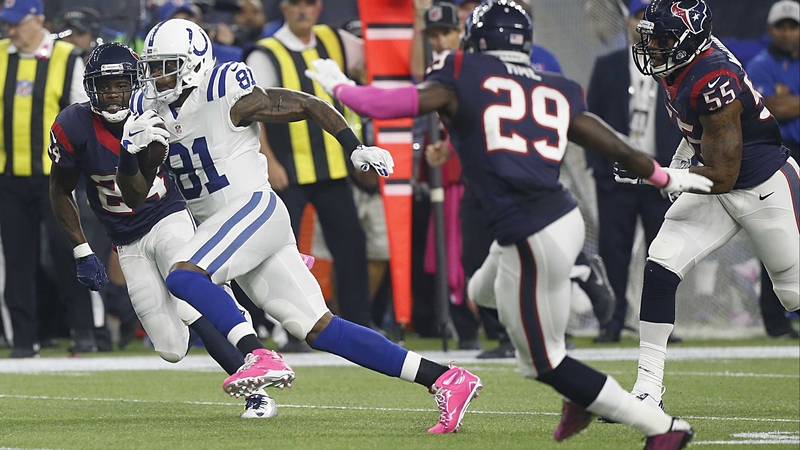 Andre Johnson (L) touched down twice