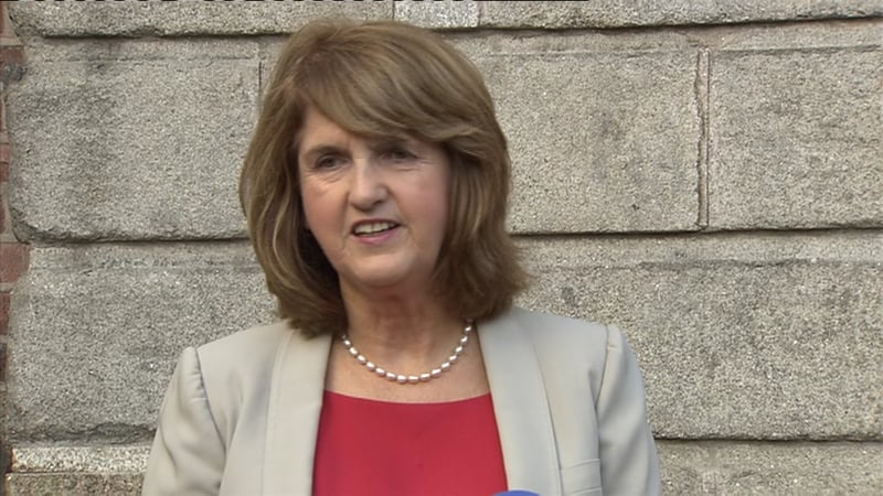 Opposition TDs were critical of Joan Burton's record