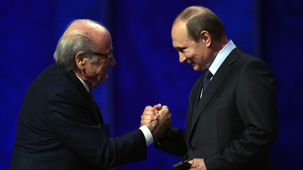 Sepp Blatter and Russia President Vladimir Putin during the Preliminary Draw of the 2018 World Cup in Russia