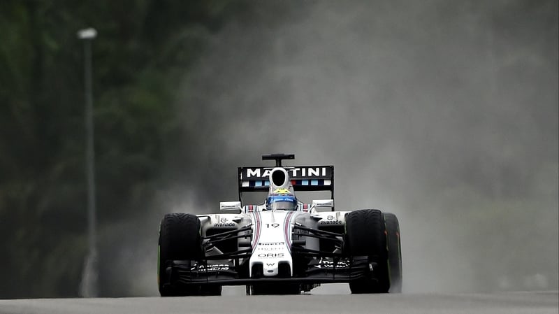 Felipe Massa battles through wet conditions in his Williams