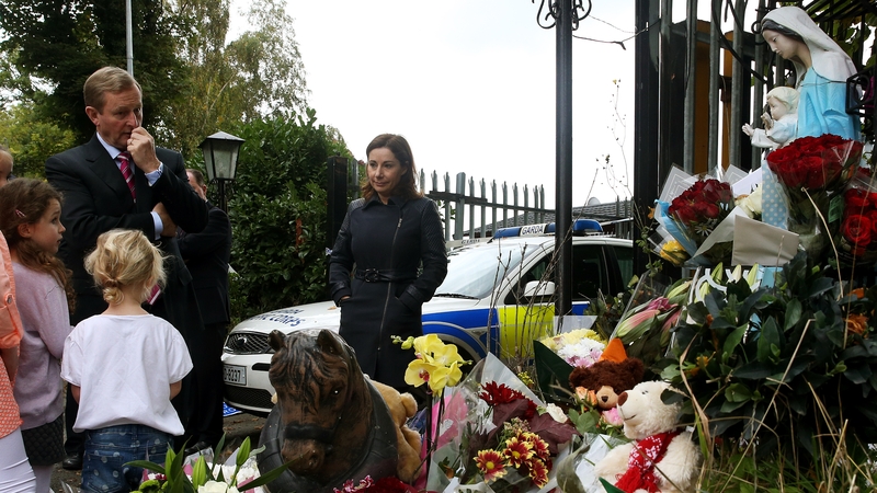 Taoiseach Enda Kenny pays his respects to the victims of the fire