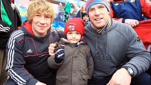 With Munster team-mate Jerry Flannery and young fan Charlie Mulqueen at a 2011 training session
