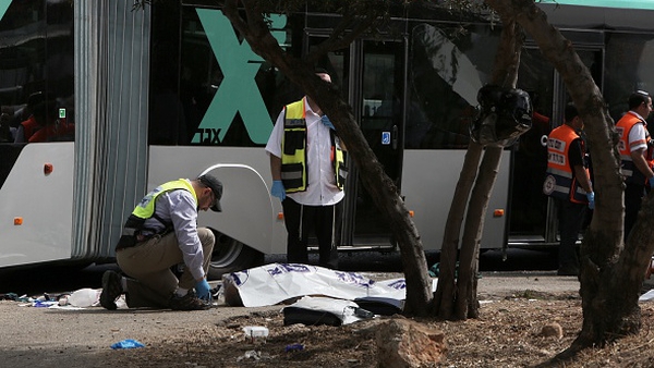 Media reports said one of the attackers used a gun and the other a knife
