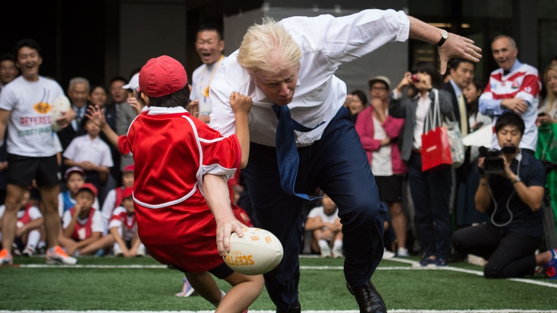 The British Prime Minister dabbles with the oval ball from time to time