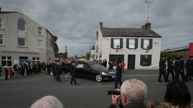 The procession makes its way to St Oliver Plunkett Church