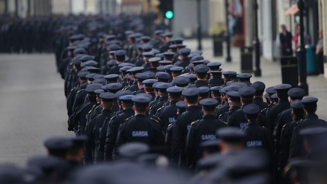 The funeral procession of Garda Tony Golden passes through Blackrock village