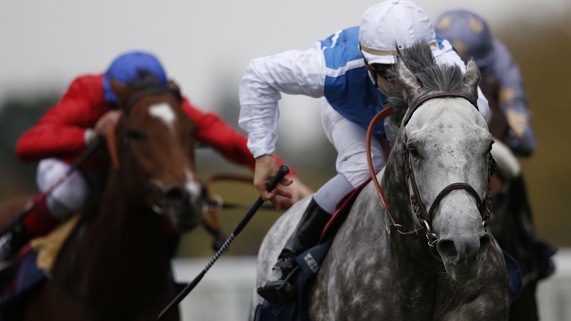 Maxime Guyon riding Solow (R) to win The Queen Elizabeth II Stakes at Ascot