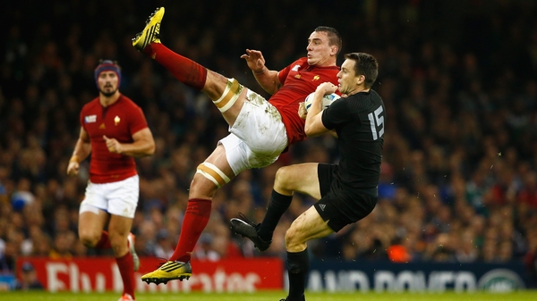 New Zealand full-back Ben Smith goes for a high ball with France's Louis Picamoles