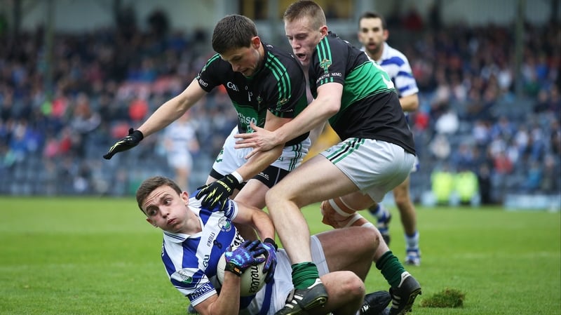 Castlehaven's Mark Collins comes under pressure from Colin O’Brien and Alan O’Donovan