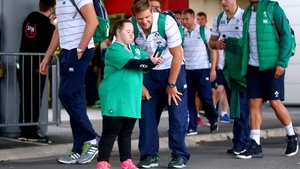 Chris Henry poses with an enthusiastic fan