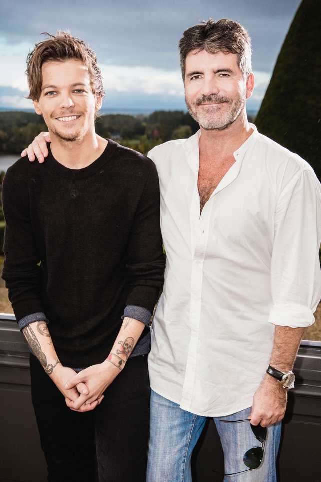 Louis Tomlinson and Simon Cowell