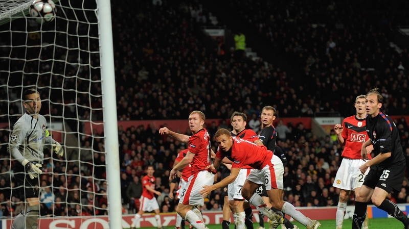 Igor Akinfeev looks on as Paul Scholes scores United's second goal in a 3-3 draw back in 2009
