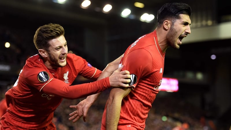 Liverpool midfielder Emre Can (R)