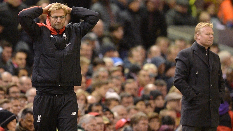 Liverpool manager Jurgen Klopp (L) reacts on the touchline as Southampton's manager Ronald Koeman